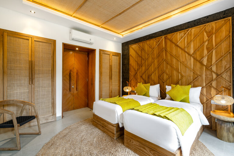 Suite 2 has a king-size bed, air conditioning, dressing room, separate WC and an indoor shower room leading to an outdoor bathroom with bath.